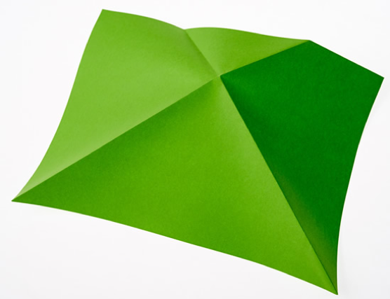 Grønt ark som er brettet i fire